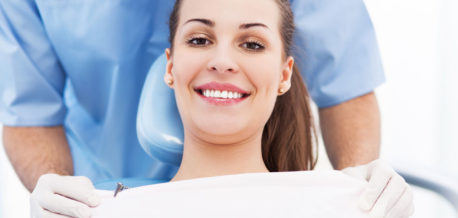 Women Smiling Dental Chair